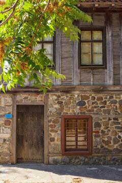 old facade with grunge doors and windows. architectural background