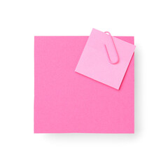 Pink sticky notes with paper clip on white background