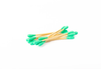 Cotton swabs isolated on white background. Bamboo cotton buds. Means for hygiene of ears. Eco friendly materials.