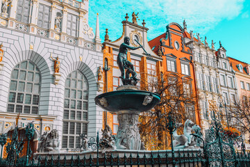 View on the famous Neptune fountain in the center of the old town of Gdansk, Poland. High quality...