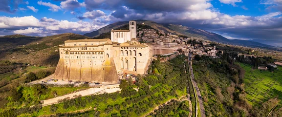 Gordijnen Impressive medieval Assisi town in Umbria. Italy.  aerial drone panoramic view. italian travel and best destinations © Freesurf