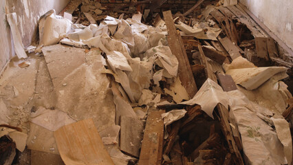 The floor, the interior, of an abandoned ruined old building