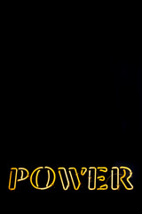 Yellow neon sign that says power, isolated on black background