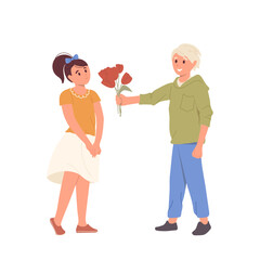 Cute shy smiling teenager boy giving bouquet of tulip spring flowers to loving girlfriend