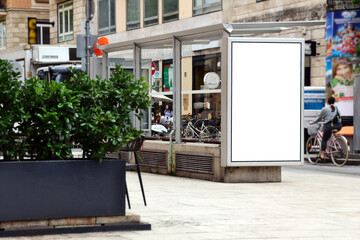 bus shelter at a busstop. blank billboard ad display. empty white lightbox sign. city transit...