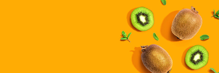 Fresh green kiwis overhead view - flat lay