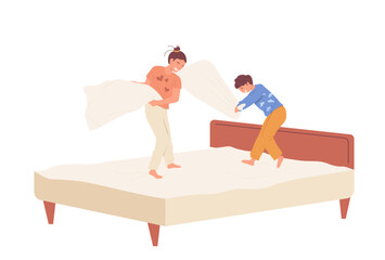 Older sister and younger brother fighting pillows on bed at home bedroom, siblings having fun