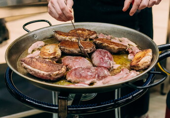raw meat pork pan frying cooking kitchen