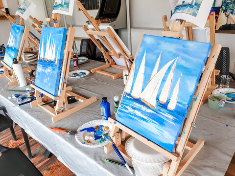 Turkey Marmaris 01.04.2023 Painting masterclass. Art party in restaurant. Glass of wine. Aquarelle watercolor, acrylic paints. Beginners class. Seascape nautical marine theme, sea boats, ships sails
