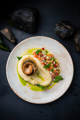 Dinner smoked mackerel fillet with mashed potatoes, vegetable salad and greens.