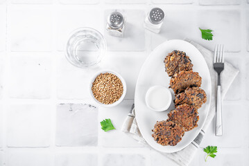 Buckwheat mushroom fritters in a plate with sauce