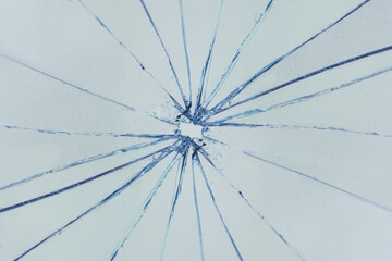 Cracks on glass, broken window, background texture