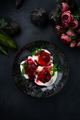 Cheese pancakes with cherry jam, sour cream and mint.