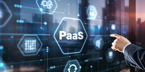 Hand pressing button on interface PaaS, Platform as a Service. Internet and networking concept