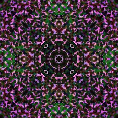 Decorative geometric pattern. Seamless colorful pattern of abstract spots. For design, fashion, textile, fabric, bandana, tile, carpet, print. Vector. Mandala in violet and green colors. Kaleidoscope.