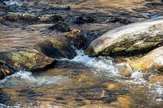 water cascading   over rocks in willard brook