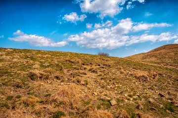 Springtime view of the Ligurian hills, seen from the top of Monte Antola; it is a small peak on the border between Piedmont and Liguria regions (Northern Italy), and is a renowned trekking destination