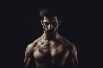 Fototapeta premium Portrait of a shirtless man after a fight