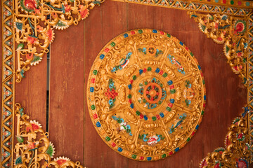 Beautiful Tibetan door at Shuhe Old Town with intrigue carving and patterns. It is a well-preserved Naxi ancient town, listed as UNESCO World Heritage site in 1997. 