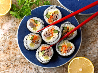 Home made Sushi rolls with    ground beef      and vegetables