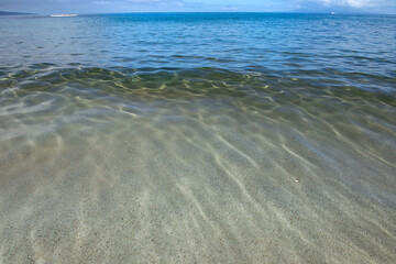 Tropical beach with sea sand on summer vacation.