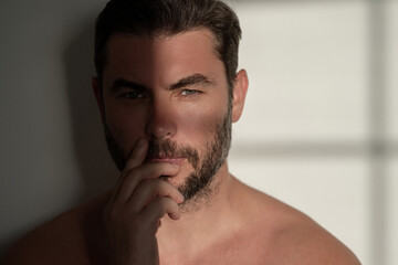 Man cosmetic, skin treatment on studio background. Hygiene and face. Matural mens cosmetics and...