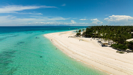 Fototapeta premium Aerial drone of beautiful tropical beach and blue sea. Bantayan island, Philippines.