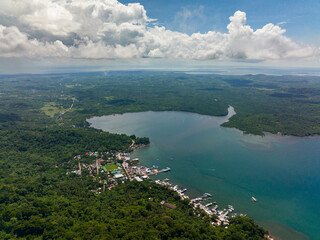 Obraz premium Aerial view of city and port on Balabac Island. House standing on the sea in the fishing village. Palawan, Philippines. Philippines.