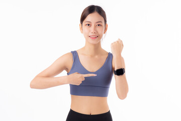 Happy young asian woman looking and pointing smartwatch for exercise and aerobics with cardio isolated on white background, female looking smart watch while workout with health, sport concept.