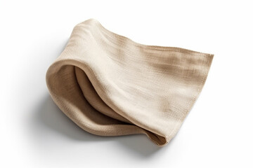 A brown linen napkin on a white surface.