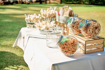 Sweet table with desserts during wedding