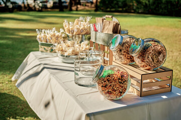 Sweet table with desserts during wedding
