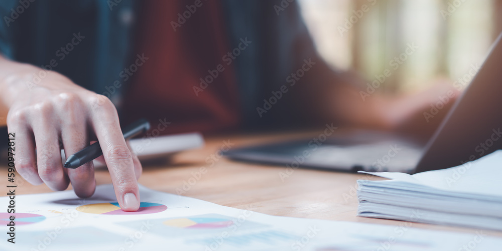 Poster businessman reading graph report and business statistics charts ,analysis and improvement of corpora