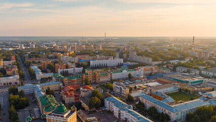 Fototapeta na wymiar Yoshkar-Ola, Russia. Administration of the Head and Government of the Republic of Mari El. city center during sunset, Aerial View