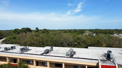 Air conditioning units on apartment building roof in florida