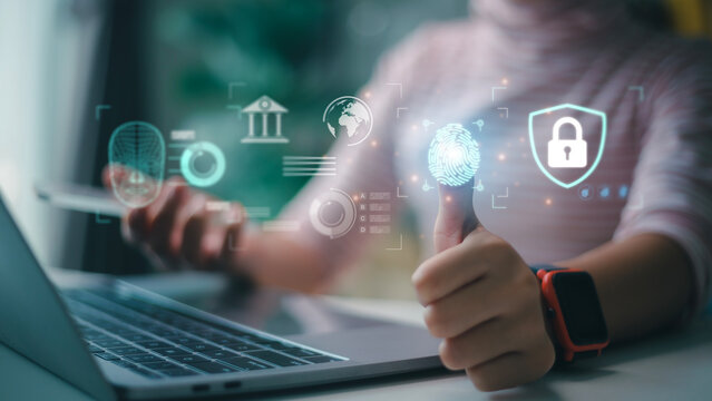 Women use fingerprint identification to access personal financial data. for E-KYC electronic know your customer, biometrics security, innovation technology against digital cybercrime