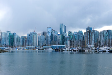 Obraz premium 4k Beautiful harbour, port, marina, haven, sailing boats, yachts, blue water, lake, bay, trees, park, house, docks, calm, sunny day. High quality 4k footage