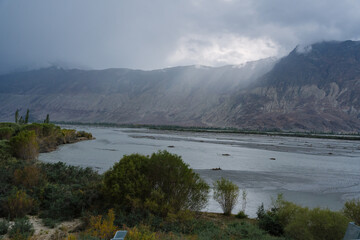 Fototapeta na wymiar beautiful scenery: mountains and trees in Yarab Tso valley, Leh Ladakh - India