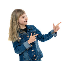 Portrait of little girl pointing at side by index fingers and smiling, isolated on white...