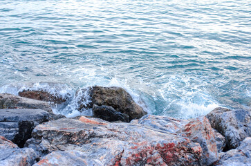 Sea waves crashing and spashes on stones alanya turkey