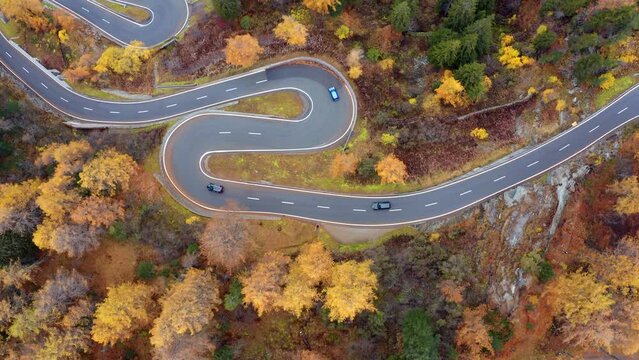 4k drone flying over footage (Ultra High Definition) of Maloya pass. Colorful morning scene in Swiss Alps, Upper Engadine in canton of the Grisons, Switzerland. Traveling concept background.