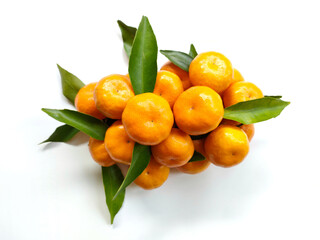 Ripe Tangerines with leaves isolated on white background