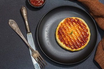 Grilled Halloumi cheese served on plate. Cutlery, traditional food for picnic or BBQ