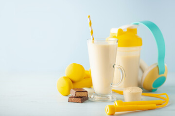 Protein sport shake and workout equipment. Fitness food and drink.