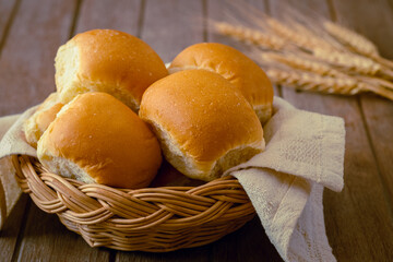 Soft bread rolls in wicker basket