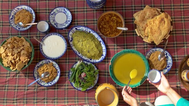 Persian dining table colorful delicious healthy food and dessert vegetable sabzi symbol of Iranian cuisine gourmet eastern Asia taste and travel leisure in a traditional historical local people house 