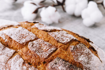Bread rye, whole grain on a grey background
