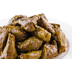 rice wrapped in grape leaves on plate