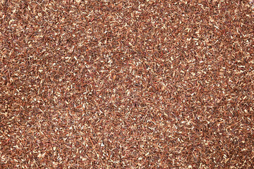 Green rooibos tea organic. Green rooibos coarse cuts. Dried Green rooibos background stock image. herbal tea ingredients.