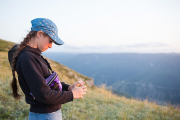 summer camp. hiking in mountains for kids and teenagers